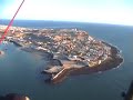 john takes a flight over the sandy beach at rocky point mexico. pilot is alfredo, flying a 55hp cosmos brand ultra light trike.
