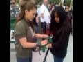 Alyssa Milano & Chris Gorham demonstrating with Iranians