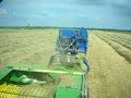 Baling hay with a bale bandit and JD459