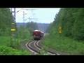 Freight train 4135 accelerating full throttle over crossing