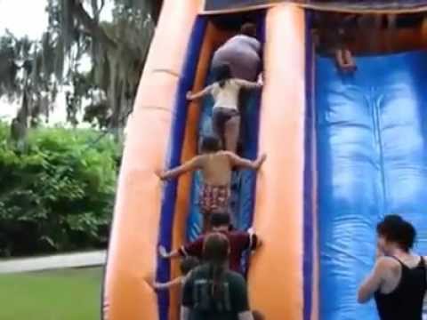 Fat woman falls down steps & wipes out a line of kids