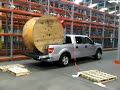 no forklift? no problem- comm techs getting the job done no matter what! reel of innerduct offloaded using cave man technology