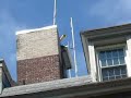 The noon horn blasts atop Ossining Town Hall.  Every day at 12 noon, this horn gives three blasts.  It also serves as one of the numerous town fire sirens.  In the beginning of the video, you can hear the bells chiming from the First Baptists Church.  The horn doesn't blow until the 1:07 mark.  For those of you who are wondering, this is a Gamewell Diaphone Type 2, which is a piston driven horn, and yes, it is extremely loud.  If you have any questions about the video, feel free to message me.  Comments are welcome.  The video was taken on August 28th, 2008.
