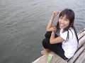 Lao girls relaxing by the river.