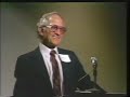 Robert Noyce is credited with Jack Kilby for the invention of the integrated circuit and co-founded both Fairchild Semiconductor and Intel. In this 1984 lecture, Robert Noyce reviews the development of the integrated circuit from its infancy in the 1950s to the early-1980s as well as its impact on technology and society. Noyce discusses the innovations in transistors that lead to the creation of the integrated circuit. Next, Robert Noyce talks about the technical challenges of building increasingly more compact and more powerful semiconductors as well as the overall effects of Moore's Law. Finally, Noyce looks ahead to the future of semiconductor development that was uncertain at the time of this lecture, but is now in our past. Robert N. Noyce was born in Burlington, Iowa and grew up in Grinnell, Iowa. A physics major at Grinnell College, he graduated with a PhD in physics from Massachusetts Institute of Technology in 1953. William Shockley hired him from Philco Corporation to work at Shockley Semiconductor Laboratories in 1956. With eight other employees he left to found Fairchild Semiconductor Corporation in 1957. As general manager of the Fairchild semiconductor operation and a vice president of Fairchild Camera and Instrument, he presided over a decade of innovation in semiconductor technology including co-invention of the integrated circuit. In 1968 Noyce co-founded Intel Corporation with Gordon Moore where he served as President until 1975 when he became Chairman <b>...</b>