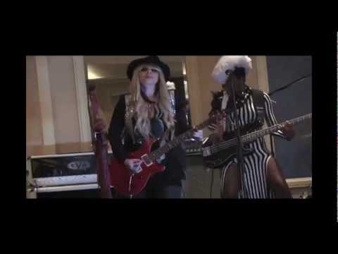 Orianthi - Video by Craig Claiborne. Orianthi rocks the house at the 2013 She Rocks Awards along with bassist Nik West and drummer Brittany Maccarello! This event is pr...