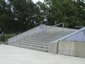 Biker falls on his head trying 10 stair rail