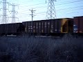 EJ&E J-Ball #654 Leads Taconite Train East, Crest Hill, IL. EJ&E J-Ball #654 Leads Taconite Train East, Crest Hill, IL.