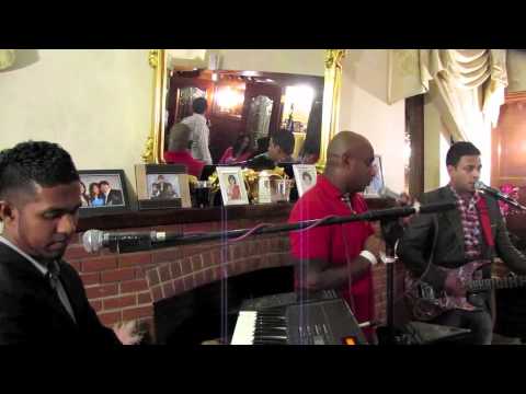 Jayasuriya singing with The Islanders (UK band) on his 42nd birthday in London