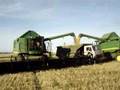 John deere combine's load russian truck!
