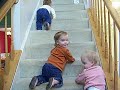 Triplets Climbing Stairs