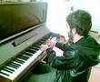 Congorock plays the piano @ Bob Rifo's Home