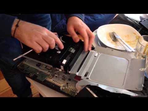 how to open a jammed cd player