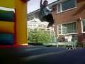 Josh Jumpin Off The Trampoline On To The Bouncy Castle.