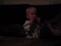 Isaac playing Harmonica