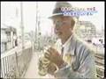 grandpa doin some magic in japan on a japanese subway & park