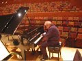 manny ax decides which piano he wants to perform on with orpheus chamber orchestra before their concert in los angeles - shot by sophia kessinger, violinist