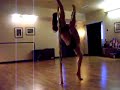 TranZenDance Studio's Lori A. Huett demonstrates a variety of higher-level pole dance moves