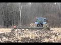 New Holland T7060 plowing