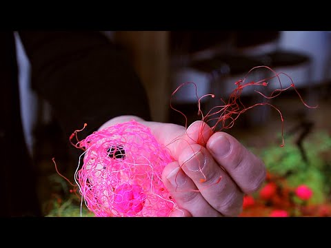 pink recycled plastics woven into ball