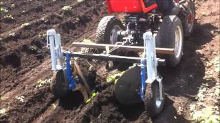 дисковый окучник после дождя