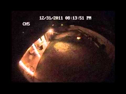 UFO Tempe - My girlfriend and I were in the back yard when this huge green oval shaped thing shot across the sky. You can see me getting up and running as it shoots acro...
