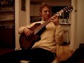 eliot fisk playing the double of the sarabande from bach's bm violin partita on carla kelly's rare organic electric classical guitar with a galactic theme- the stellar class. this was filmed at a casual get-together at the fisk residence in 2006.
