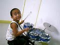 michaeljon cantil playing drums and guitar