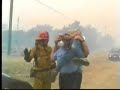on the second day of this california wildfire, the wind driven flames burn out of the san bernardino national forest and into a ranch style neighborhood just outside the town of apple valley.

this fire began near lake arrowhead on saturday august 28, 1999 and burned for several days. for a time it was the largest fire in the nation, until others surpassed it.

on sunday afternoon, august 29, the wind kicked up and pushed a wall of flames north into the area of homes, twelve were destroyed. several caught fire before firefighters staged nearby even knew it.

in my video, 5 homes are shown burning, firefighters are working on saving one structure as fire rages around us, an elderly man is carried away from his property and convinced to leave and other scenes of the fire.

shot on svhs, originally aired on 