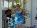 Terri Gore, the Original Carolina Girl performing a song written and made famous by her father, Jackie Gore, at the Plantation Hotel & Resort in the Summer of 2004.