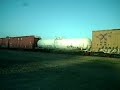 union pacific freight with a CSX unit and a red tank car!!