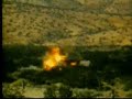AH-64 Apache firing. AH-64 Apache firing.
