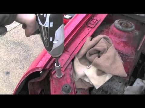 how to change a clio headlight bulb