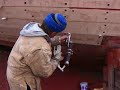 Caulking a wooden boat