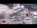 Raw Video: Tsunami Wave Smashes Boats and Cars