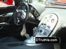 Red Buggati Veyron vs 100 km Petrol