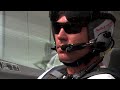 former f1 driver doornbos in a red bull air race plane