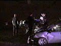 Murphysboro #4 car wreck driver in bandages being hauled away