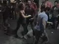 new swing sextet plays live while jason molina of puerto rico social salsa dances with jennifer aucoin of toronto. burju of hacha y machete and friend dance in foreground at 2006 congress.
