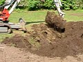 Tuinspitten met Takeuchi TB 135 Tuinspitten met Takeuchi TB 135