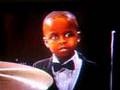 5 year old playing drums for 100+ Voice Choir