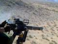 videos de James shooting Dillon gun
