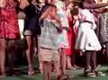 Kyle learning the Huki Lau dance in Hawaii