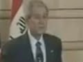 Bush dodges a shoe in slow motion