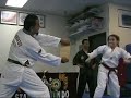 AJ breaks board with TKD spinning back kick