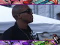 lupe fiasco skatboarding on stage