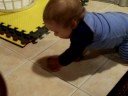 Mark McBryde playing with a ball.