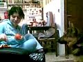 German Shepherd eats citrus clementina (Russian)
