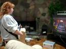 Mom playing guitar hero