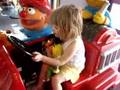 Mary rides a fire truck